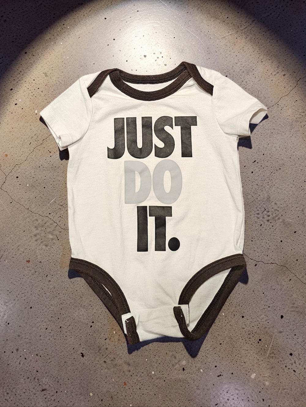 NIKE White Baby One-Piece with Black Trim & 'JUST DO IT.' Print. Size 3mnths.